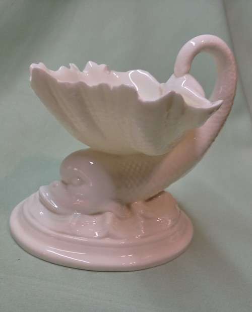Royal Wocester dolphin supporting a clam shell ornament