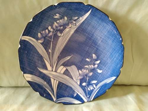 Imari plate blue background stylised orchids