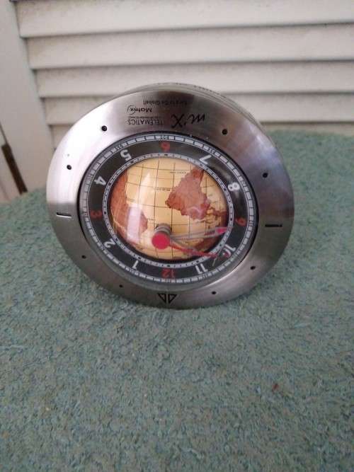 Globe desk clock unusual can lie flat or be upright in working order