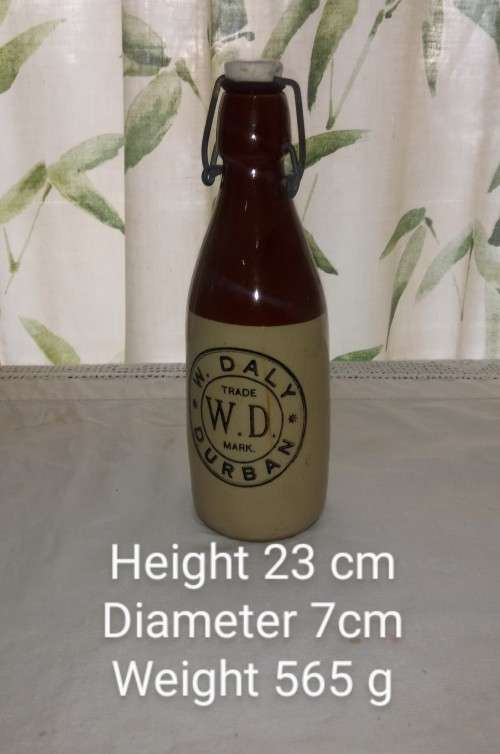 Antique W. Daly, Durban ceramic ginger beer bottle with lid