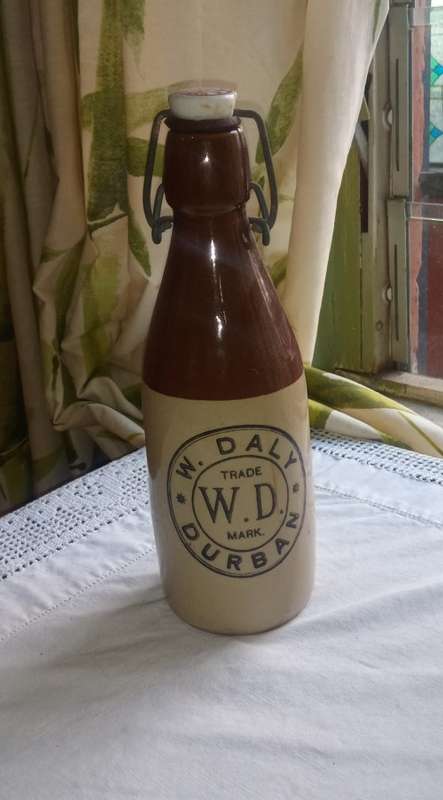 Antique W. Daly, Durban ceramic ginger beer bottle with lid