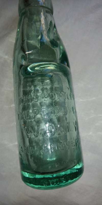 Antique W. Daly, Durban glass  bottle with marble stopper