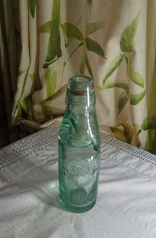 Antique W. Daly, Durban glass  bottle with marble stopper