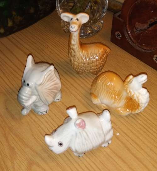 Four animals of the world ornaments. Elephant camel rhino llama