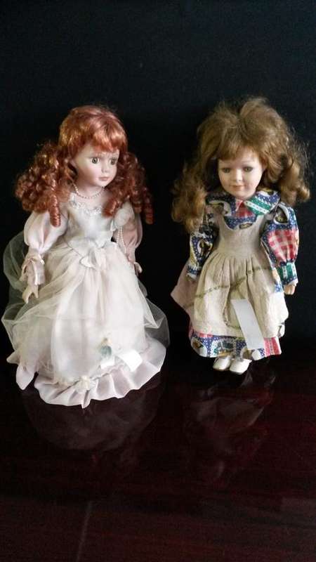 2 LOVELY PORCELAIN DOLLS