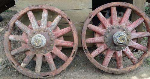 TWO BUICK WOOD AND STEEL RIMS FOR YOUR MAN CAVE