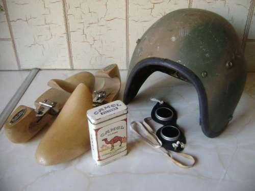 COLLECTION OF VINTAGE ITEMS, INCL ARMY HELMET, GOGGLES, OLD CAMEL CIGARETTE TIN AND SHOE STRETCHERS