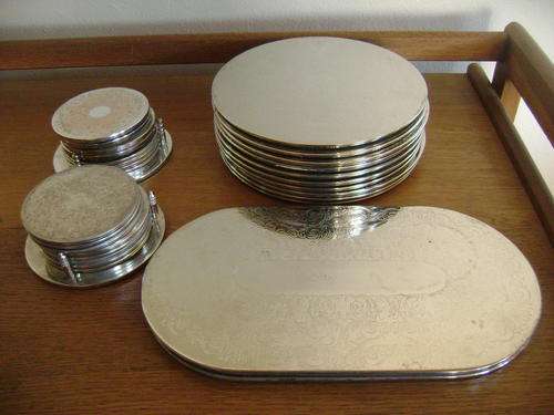 LARGE COLLECTION OF SILVER PLATED PLACE MATS AND COASTERS (29 PIECES) - SOLD TOGETHER AS ONE LOT