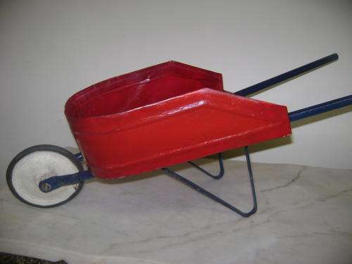VINTAGE IRON TOY WHEELBARROW