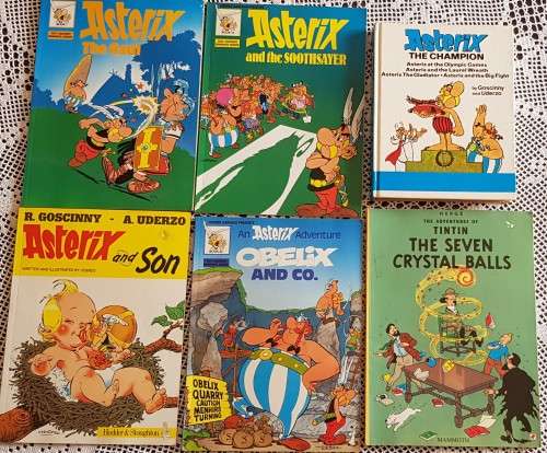 Comic books (5x Asterix plus 1x Tintin)