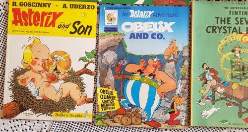 Comic books (5x Asterix plus 1x Tintin)