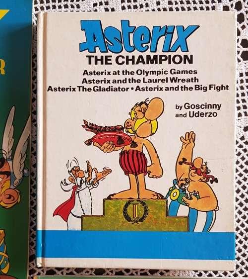 Comic books (5x Asterix plus 1x Tintin)