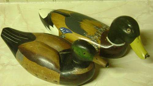 Handcarved and handpainted wooden ducks - very nice