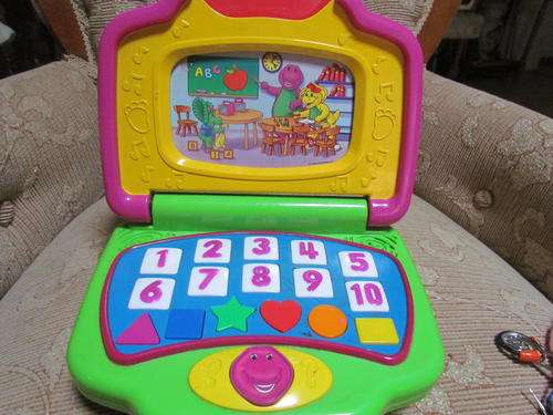 A BARNEY MUSICAL TOY!! NEED BATTERIES!!