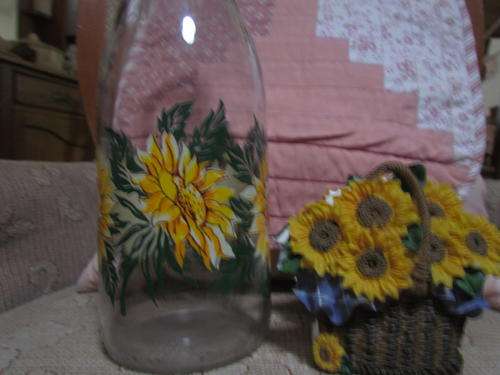 A SUNFLOWER MILK BOTTLE AND A SERVETTE HOLDER!!