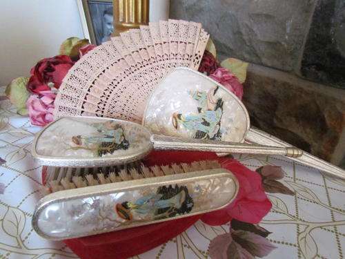A STUNNING ANTIQUE MIRROR HAIRBRUSH AND CLOTHING BRUSH!!