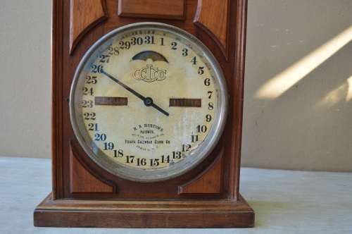 ANTIQUE ITHACA DOUBLE DIAL CALENDAR CLOCK