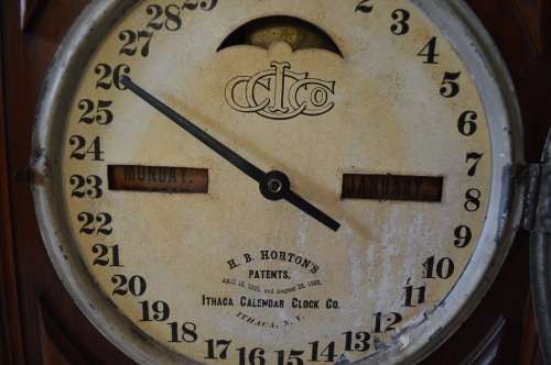 ANTIQUE ITHACA DOUBLE DIAL CALENDAR CLOCK