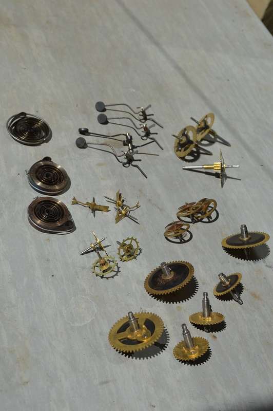 Various matching NEW clock spares