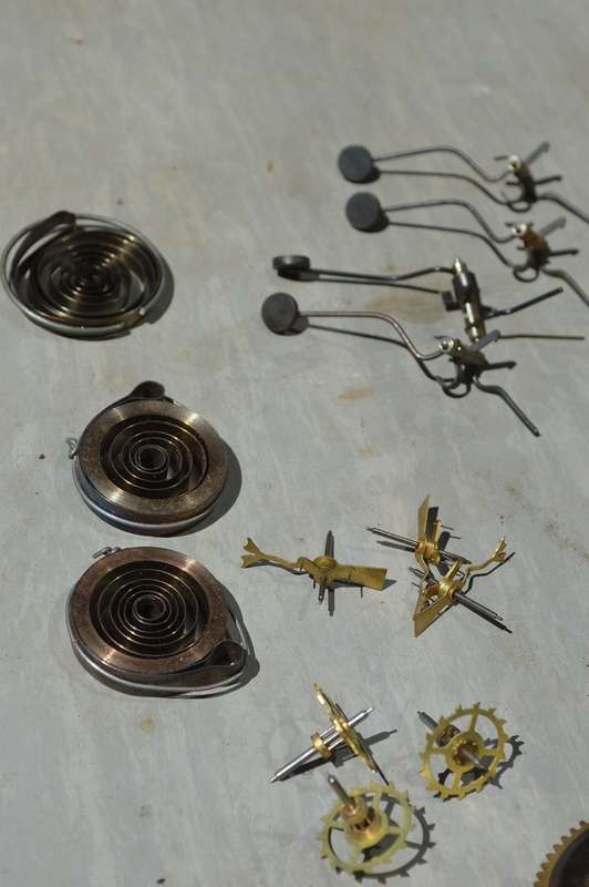 Various matching NEW clock spares
