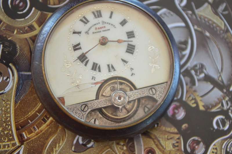 Hebdomas 8 Day gun metal pocket watch working reduced
