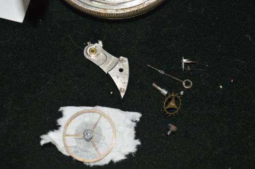 Waltham signed pocket watch with parts for repairs