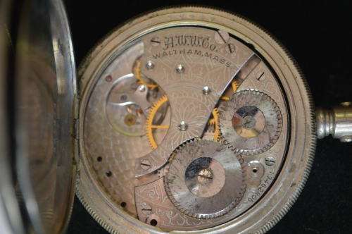 Waltham signed pocket watch with parts for repairs