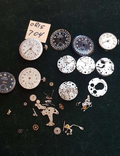 Lot of Oris 704 watch movements and spares.