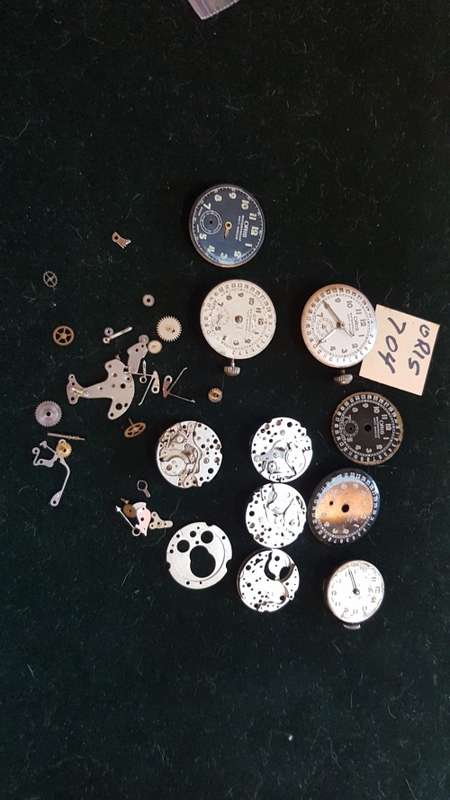 Lot of Oris 704 watch movements and spares.