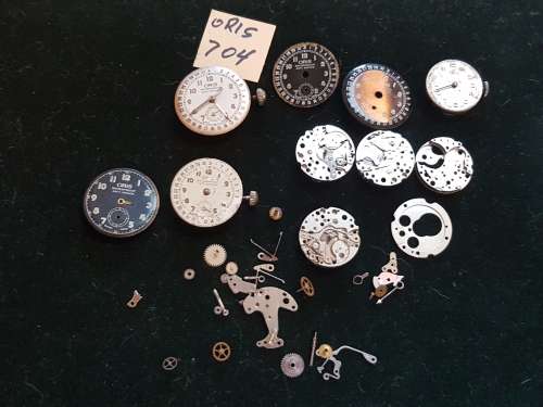 Lot of Oris 704 watch movements and spares.