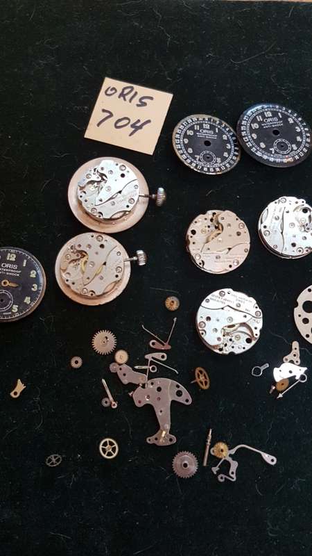 Lot of Oris 704 watch movements and spares.