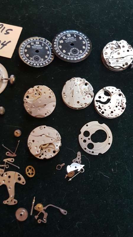 Lot of Oris 704 watch movements and spares.