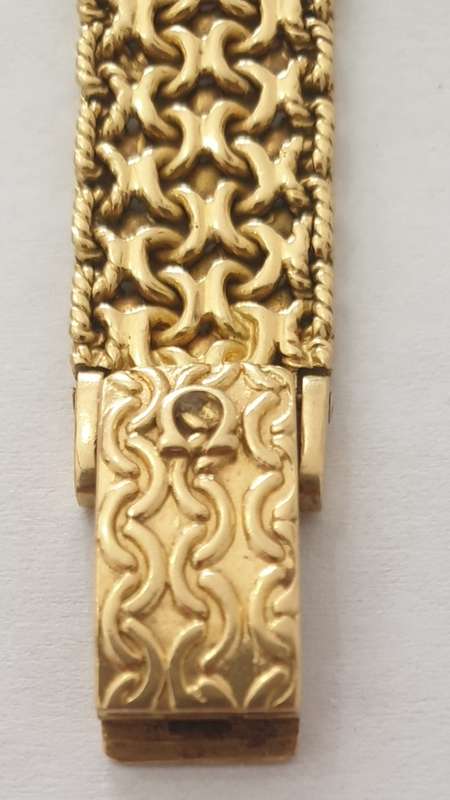 18K Gold Ladies Omega Watch.