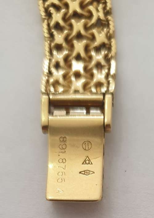 18K Gold Ladies Omega Watch.