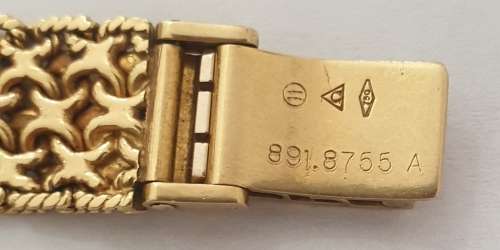 18K Gold Ladies Omega Watch.