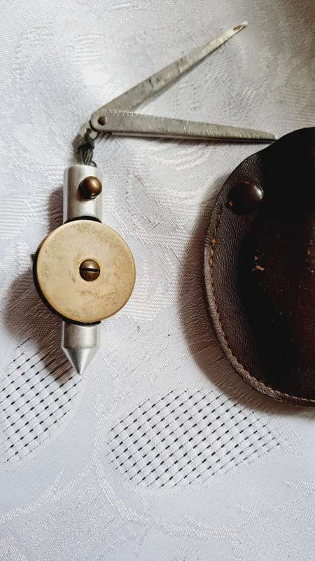 REDUCED vintage plumb bob with original leather case