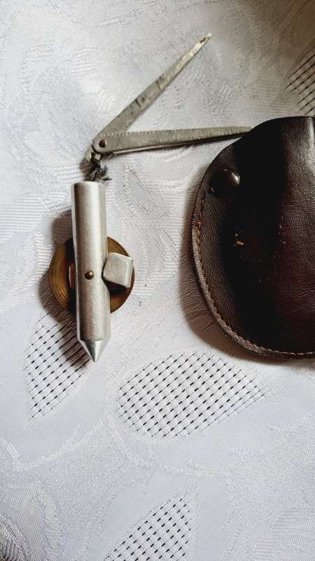 REDUCED vintage plumb bob with original leather case