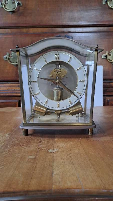 A Junghans Ato Brass And Glass Anticlimatic Electronic Clock
