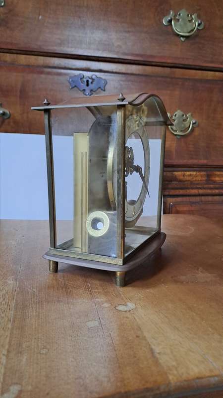 A Junghans Ato Brass And Glass Anticlimatic Electronic Clock