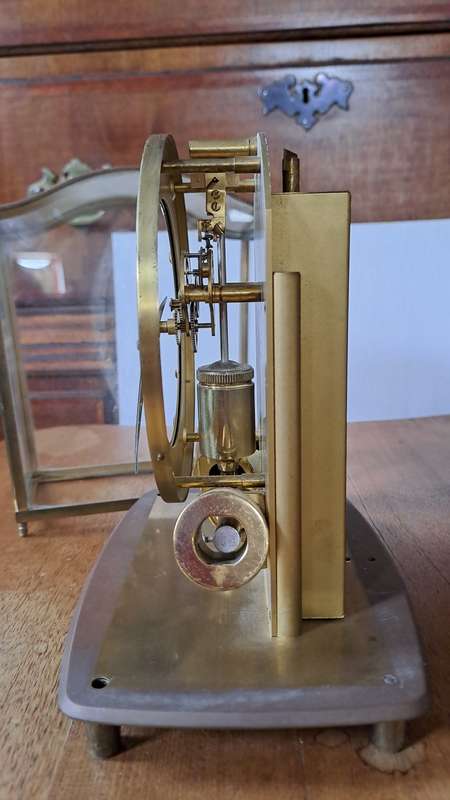 A Junghans Ato Brass And Glass Anticlimatic Electronic Clock