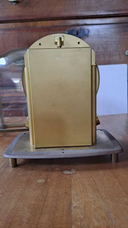 A Junghans Ato Brass And Glass Anticlimatic Electronic Clock