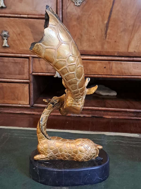 Beautiful bronze Giraffe mom and calf