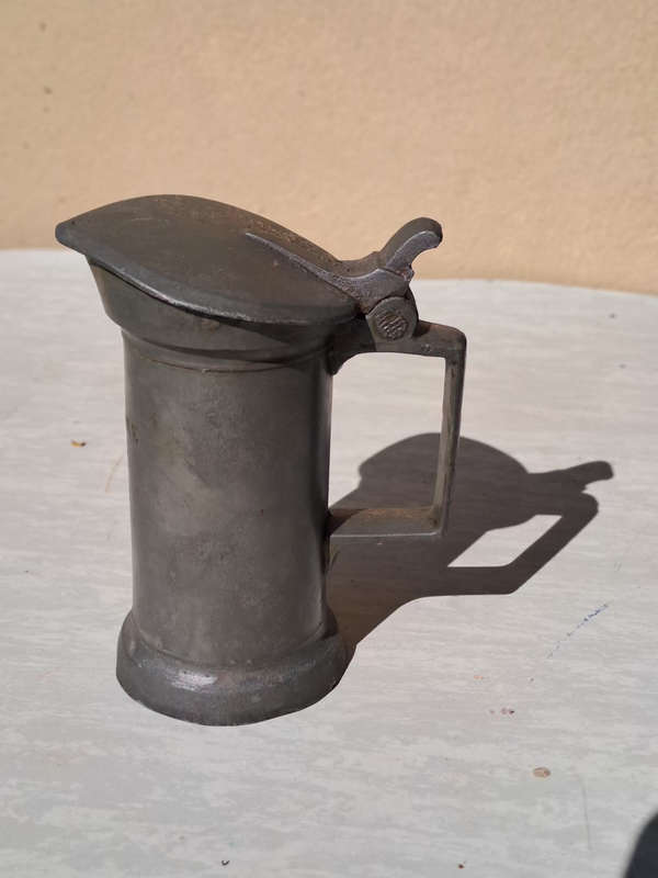Very old N&C pewter decilitre measuring jug with lid
