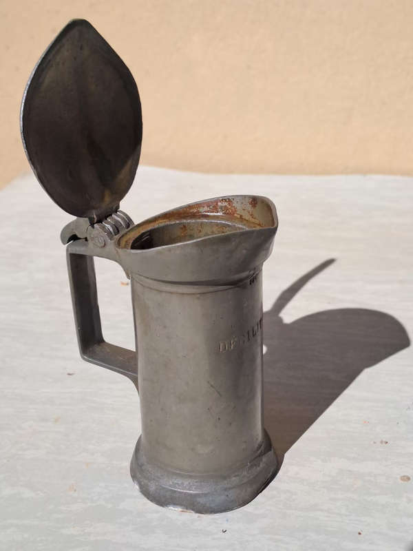 Very old N&C pewter decilitre measuring jug with lid