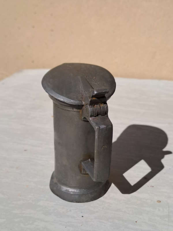 Very old N&C pewter decilitre measuring jug with lid
