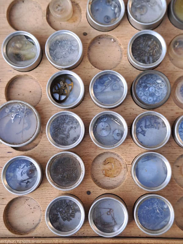 Box of vintage watch spares all sorts