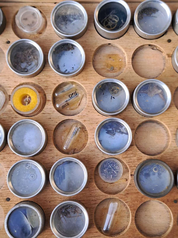 Box of vintage watch spares all sorts