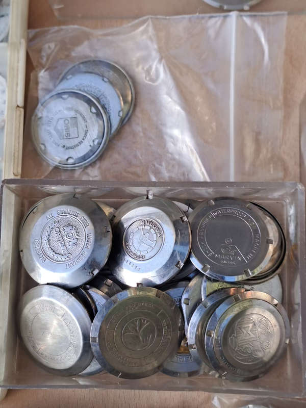 vintage watch part. back plates and faces