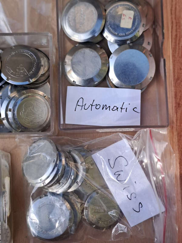 vintage watch part. back plates and faces