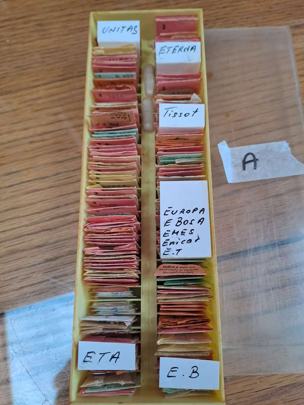 box of 100`s,  sorted and originally packed new vintage watch balance staffs REDUCED